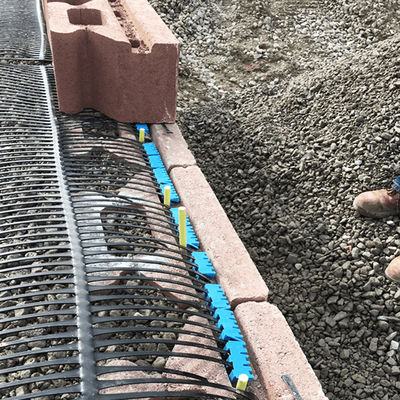 Red geográfica uniaxial de PP HDPE de 220kN negro bajo para el refuerzo de paredes y carreteras 50m