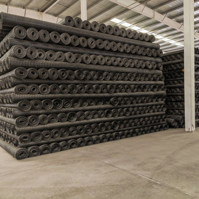 Material de construcción de carreteras Polipropileno Biaxical Geogrid con resistencia a la tracción de 15-60KN